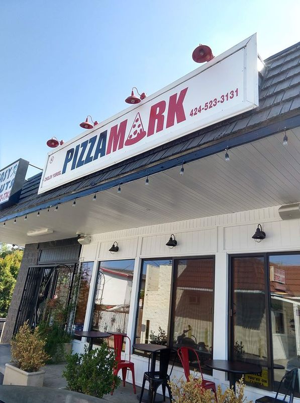 Pizza Mark LA storefront exterior on Robertson Blvd with outdoor seating