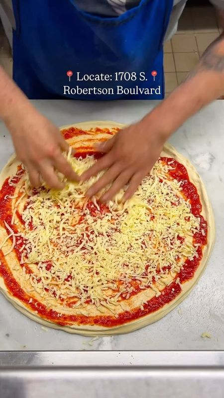 Pizza being made fresh at Pizza Mark on Robertson Blvd